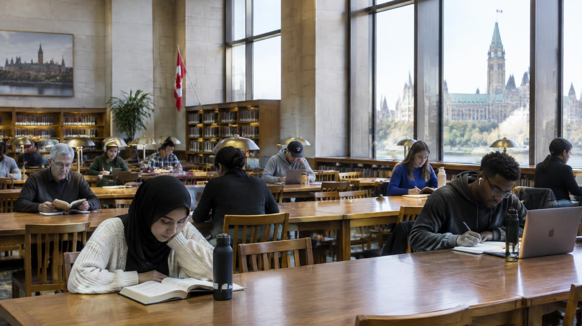 Public library reading room with people studying