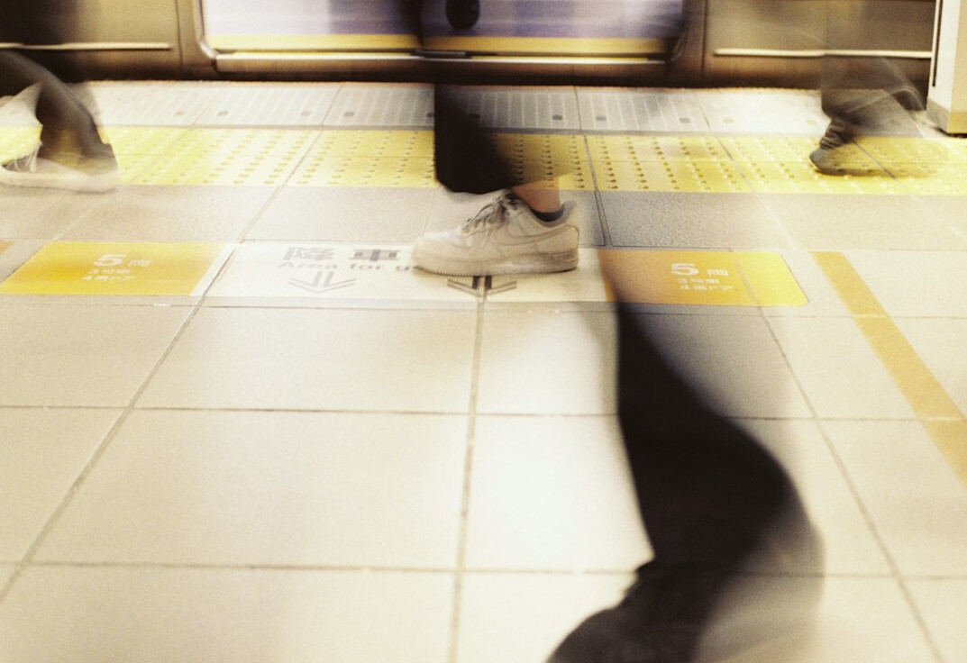 Commuters waiting on a subway platform